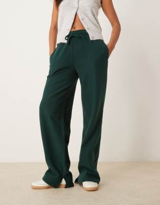 ASOS DESIGN – Mörkgrönt, supermjukt set med huvtröja och vida mjukisbyxor - view 1