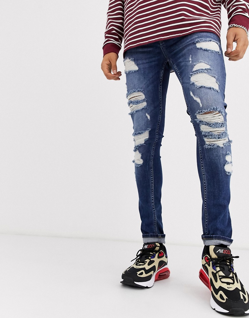 ASOS DESIGN – Mörktvättade superskinny jeans med stora revor-Blå