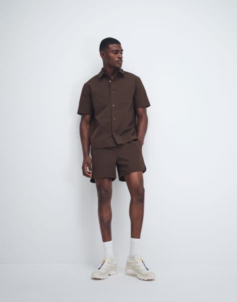 ASOS DESIGN – MotionMAX – Bruna, korta shorts med rundad nederkant - view 1