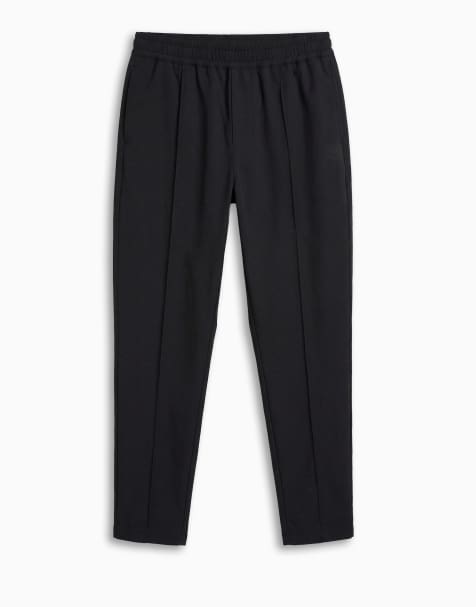 ASOS DESIGN motionMAX™ four way stretch co-ord tapered trouser in black with pintucks
