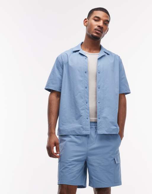 ASOS DESIGN motionMAX™ four way stretch shorter length cargo shorts in blue (part of a set), 4 of 7