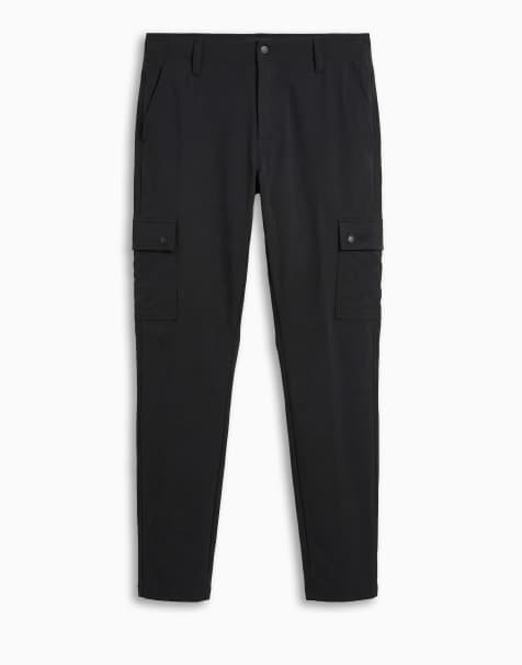 ASOS DESIGN motionMAX™ four way stretch tapered cargo pants in black - part of a set - view 1
