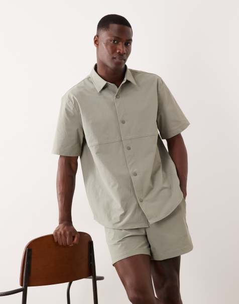 ASOS DESIGN – motionMAX™ – Kürzere Shorts in Salbeigrün mit abgerundetem Saum - view 1