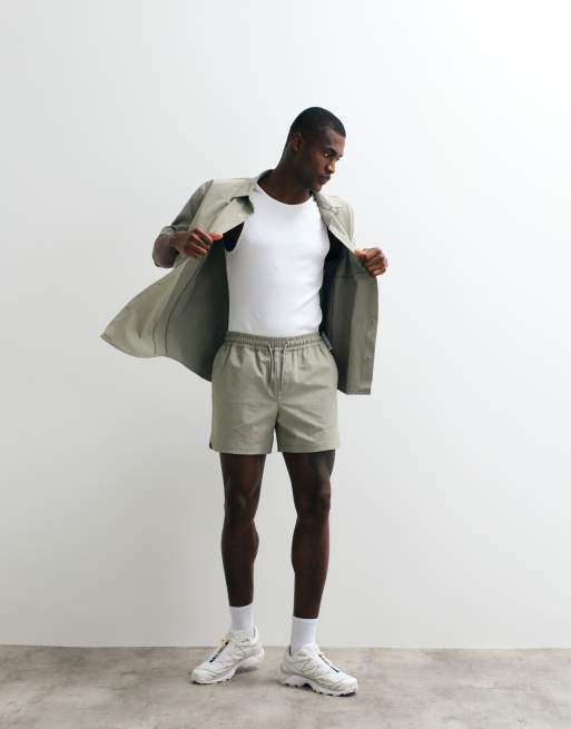 ASOS DESIGN - motionMAX - Pantalones muy cortos verde salvia con bajo redondeado, 5 de 5