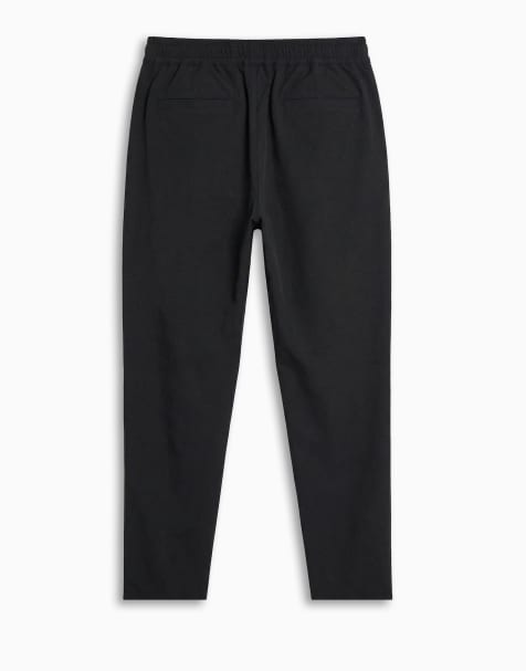 ASOS DESIGN - MotionMAX™ - Pantaloni affusolati in tessuto quadrielastico neri con pinces in coordinato - view 1
