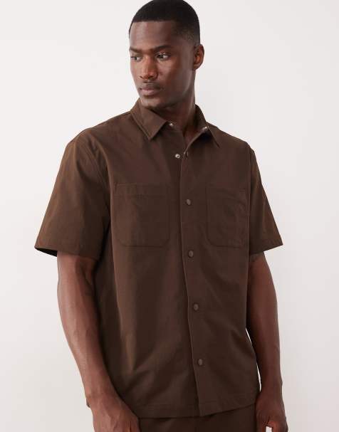 ASOS DESIGN motionMAX™ relaxed shirt with chest pockets in brown - view 1