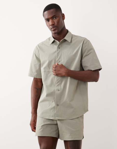 ASOS DESIGN motionMAX™ relaxed shirt with side pockets in sage green - view 1