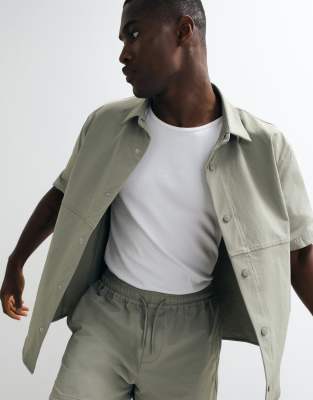 ASOS DESIGN motionMAX shorter length shorts with curved hem in sage green 9290₽