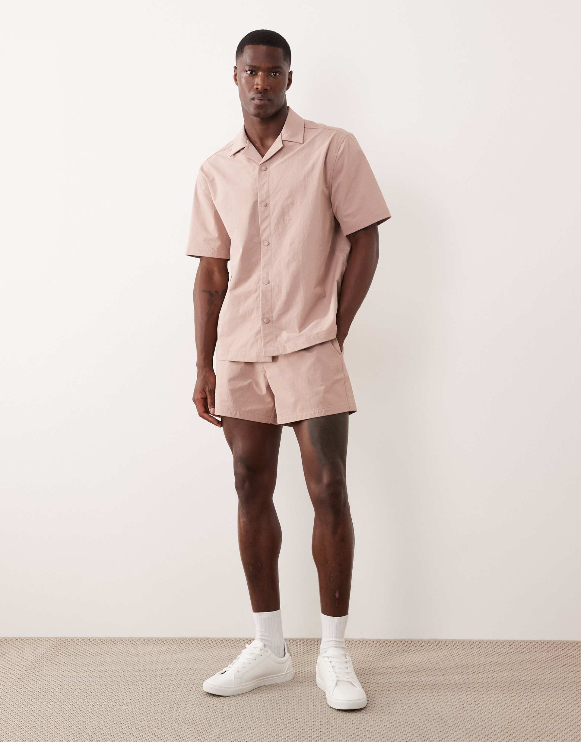 ASOS DESIGN motionMAX shorter length smart stretch shorts in pink