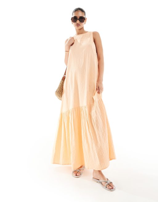 ASOS DESIGN - Mouwloze smockjurk met racerhals en stroken aan de rok in perzik fuzz