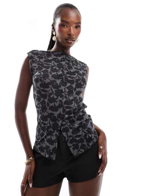 ASOS DESIGN - Mouwloze top met donkere bloemenprint en knopen in zwart