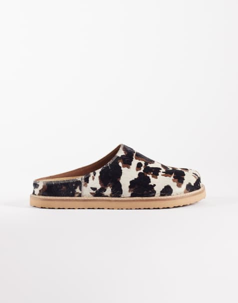ASOS DESIGN mules in cow print - view 1