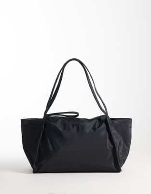 ASOS DESIGN multi compartment travel bag in black