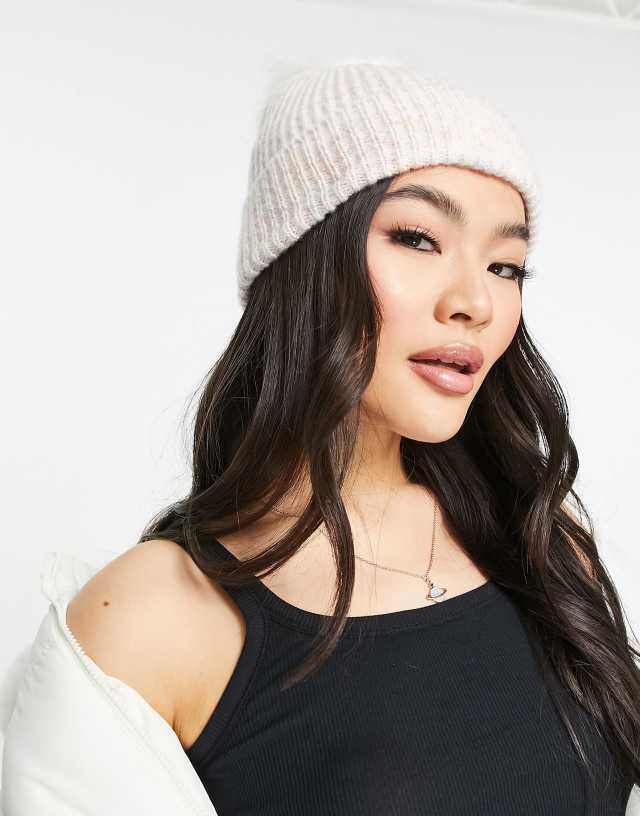 ASOS DESIGN multi knit ribbed beanie with cream faux fur pom