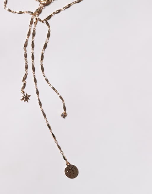 ASOS DESIGN multi layer lariat necklace with celestial detail in gold tone