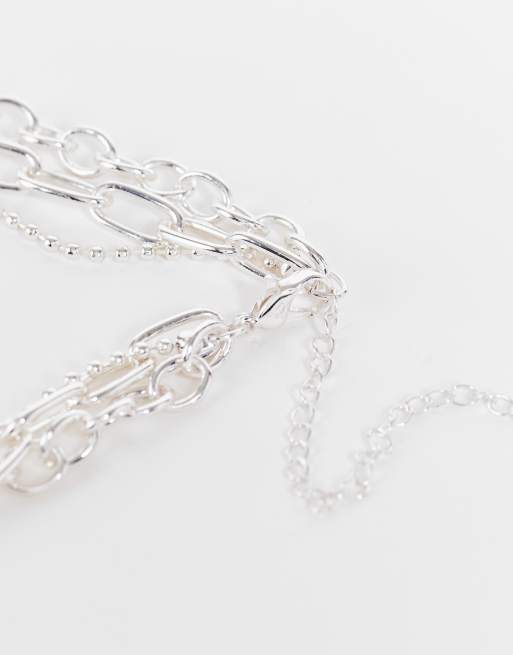 ASOS DESIGN multi layered neckchain with 90s heart padlock and butterfly pendant in silver tone, 3 of 4