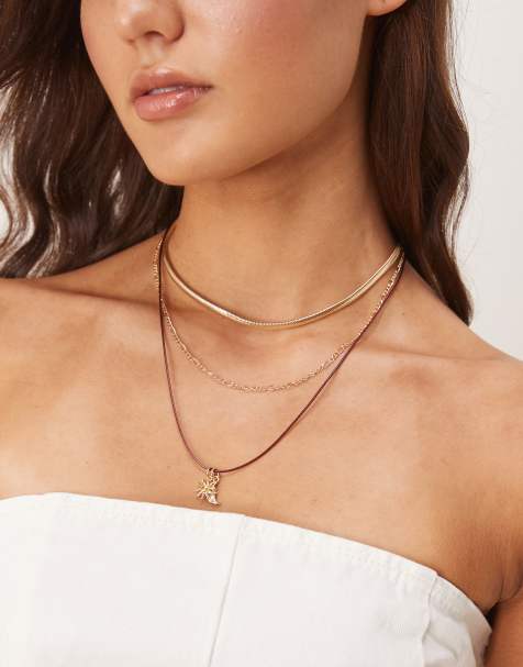 ASOS DESIGN multi-pack necklaces in cord and chain mix with gold-tone celestial charms - view 1