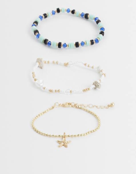 ASOS DESIGN multi-pack of beaded bracelets in blue and gold tone - view 1