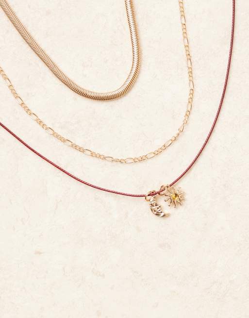 ASOS DESIGN multi-pack of necklaces in cord and chain mix with gold-tone celestial charms, 2 of 3