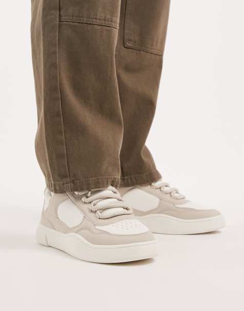 ASOS DESIGN multi panelled trainers in white with round laces - view 1