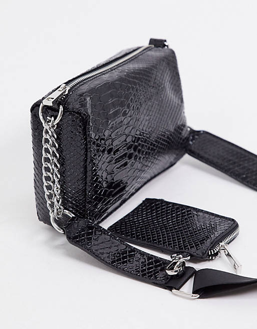 ASOS DESIGN multi pouch cross body bag in black snake