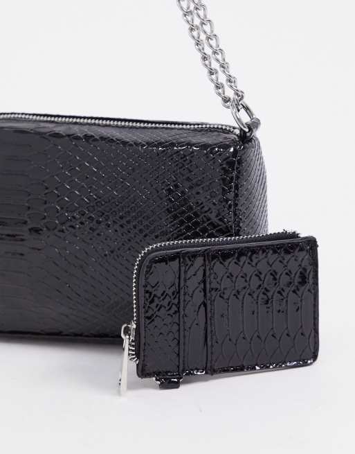 ASOS DESIGN multi pouch cross body bag in black snake