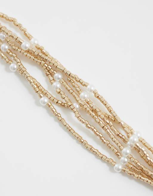 ASOS DESIGN multi-row bracelet with bead and faux pearl design in gold tone, 3 of 3