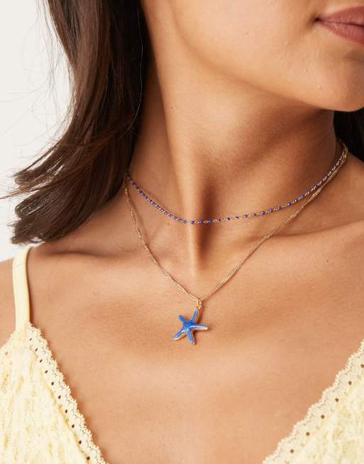 ASOS DESIGN multi-row chain necklace with blue starfish pendant in gold ...