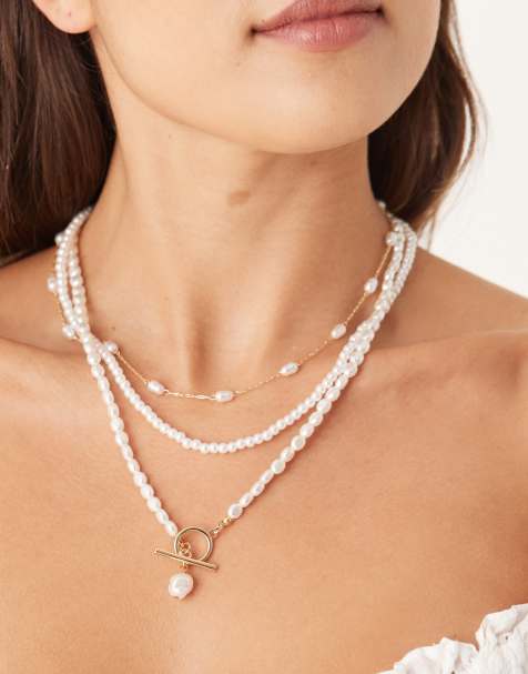 ASOS DESIGN multi-row necklace with faux pearls and t-bar detail in gold tone - view 1