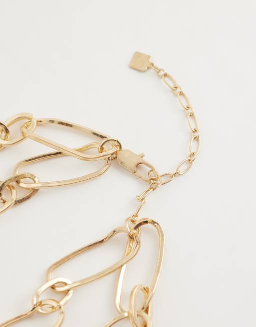 ASOS DESIGN multi-row necklace with large burgundy resin pendant in gold tone, 4 of 5