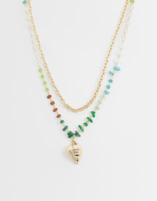 Asos Design Multi-row Necklace With Multi-colored Faux Chippings And Shell Pendant In Gold