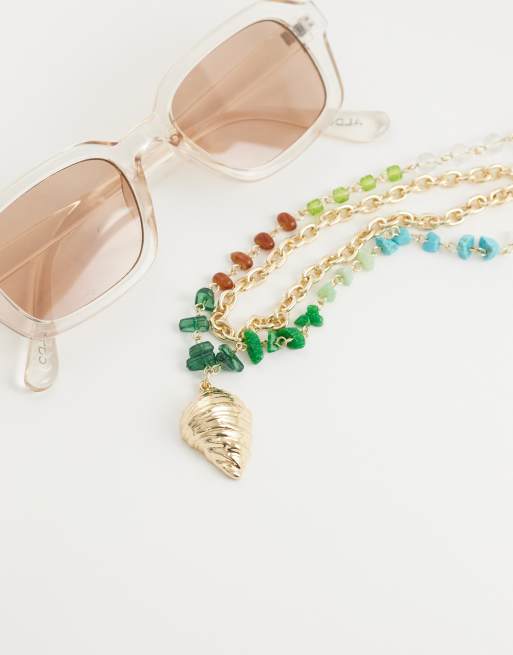 ASOS DESIGN multi-row necklace with multi-coloured faux chippings and shell pendant in gold tone, 2 of 4