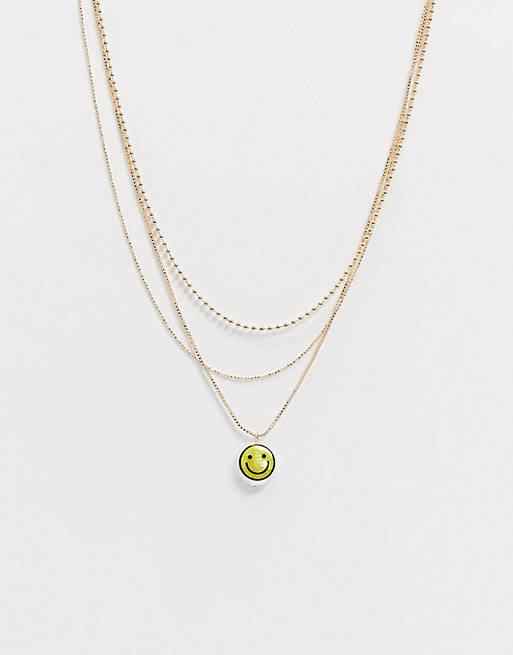 ASOS DESIGN multi strand necklace with happy face pearl pendant in gold