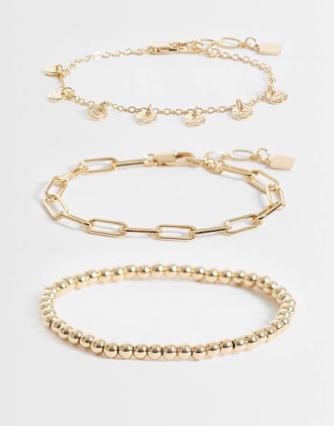 ASOS DESIGN – Multipack mit verschiedenen Armbändern in Goldoptik mit Perlen- und Kettendesign - view 1