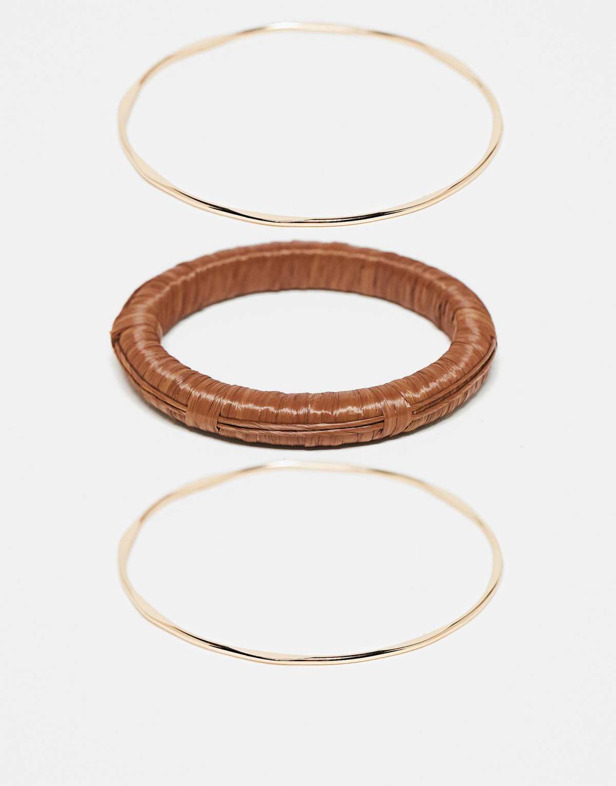 ASOS DESIGN multipack of bangles in raffia and gold tone