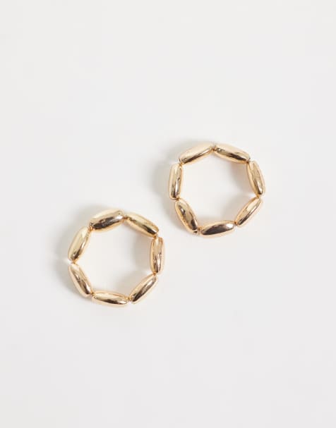 ASOS DESIGN multipack of stretch rings in gold tone - view 1