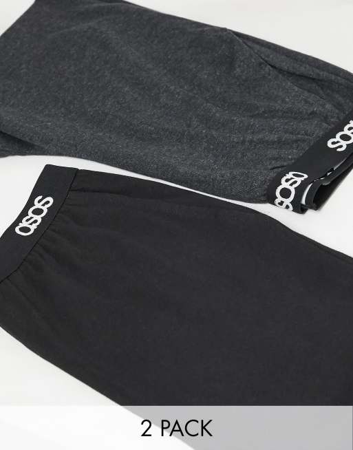 ASOS DESIGN - Multipakke med 2 lounge-pyjamasbukser i sort og koksgrå melering med branded taljebånd - SPAR