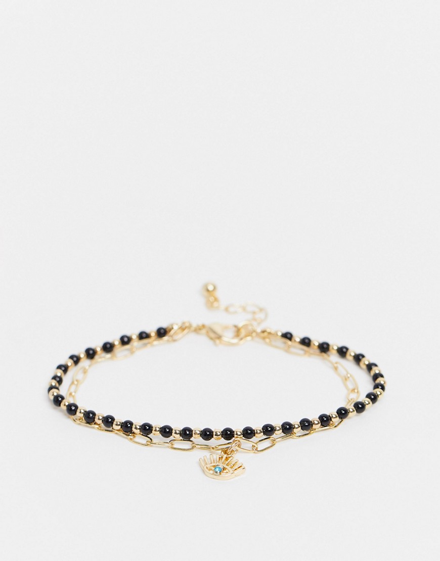 ASOS DESIGN multirow bracelet with eye charm and fine link chain in gold tone