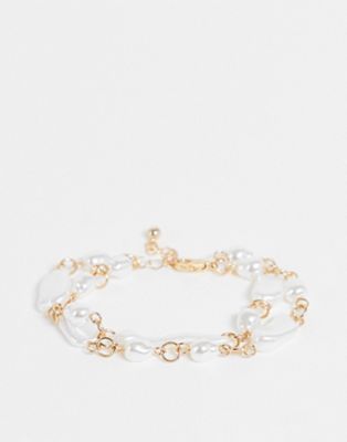 ASOS DESIGN multirow bracelet with faux freshwater pearl in gold tone