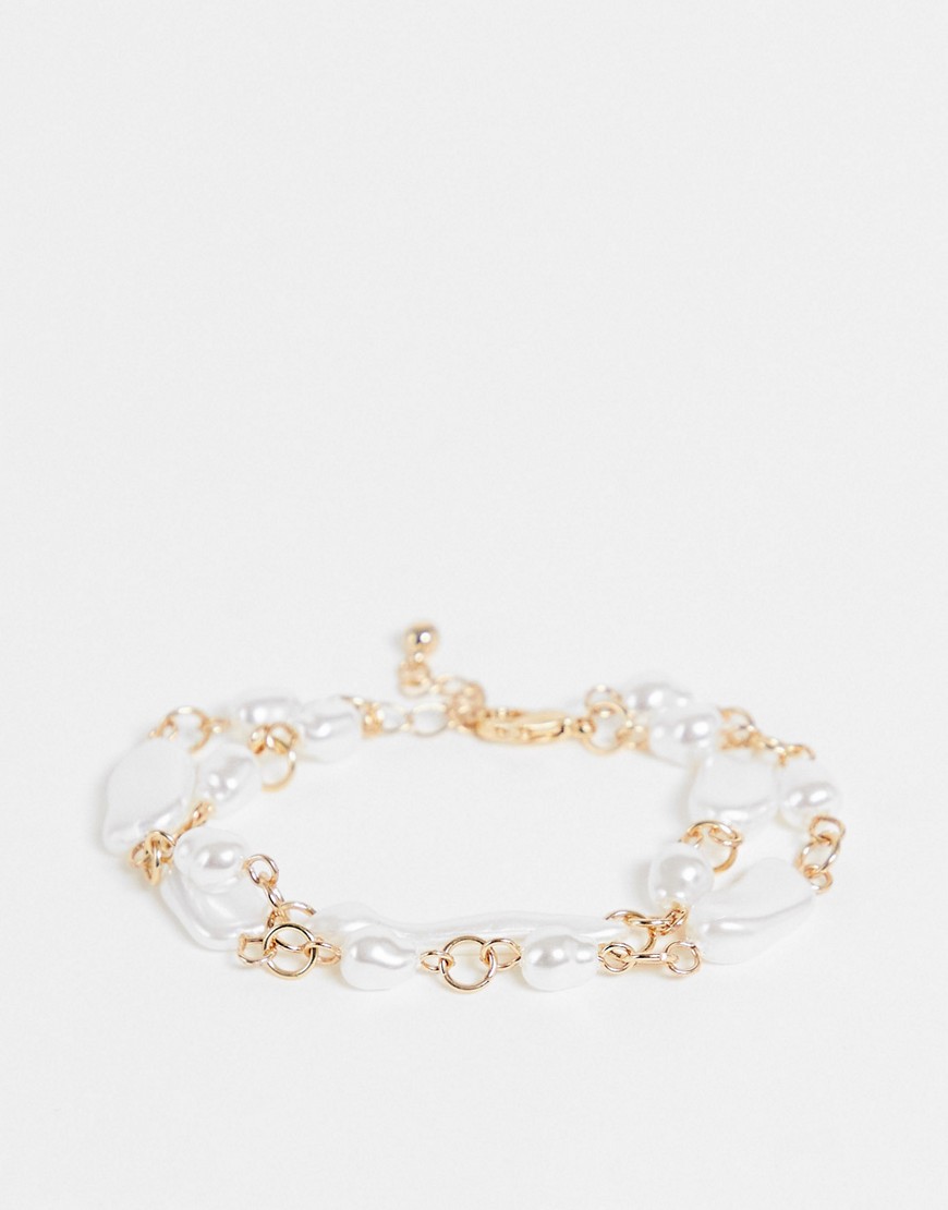 ASOS DESIGN multirow bracelet with faux freshwater pearl in gold tone