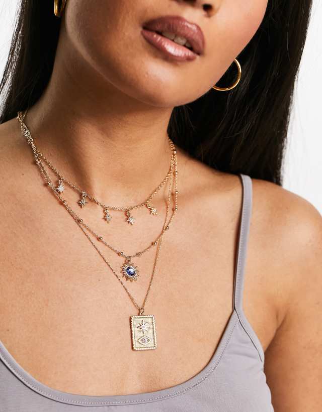 ASOS DESIGN multirow necklace with celestial and vintage pendant in gold tone