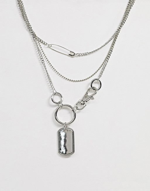 ASOS DESIGN multirow necklace with hardware clip and dog tag pendants in silver tone