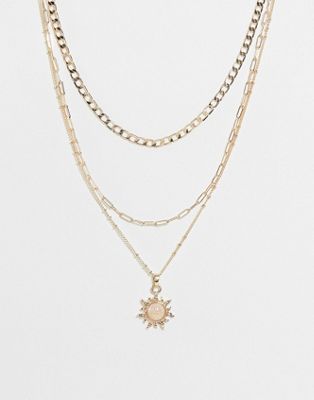 ASOS DESIGN multirow necklace with opal sunburst pendant in gold tone | ASOS