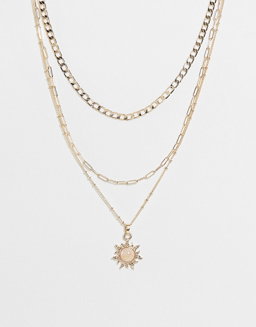 ASOS DESIGN multirow necklace with opal sunburst pendant in gold tone