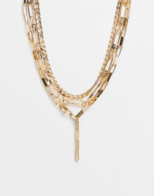 ASOS DESIGN multirow necklace with safety pins and lariat in gold tone