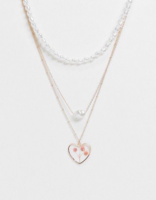 ASOS DESIGN multirow necklace with trapped floral heart pendant and pearls in gold tone