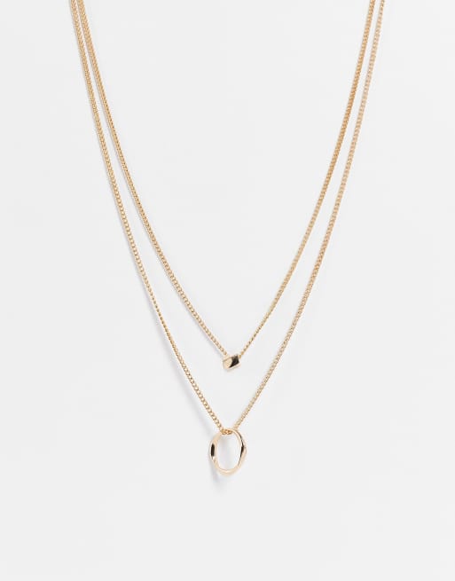 ASOS DESIGN multirow necklace with twisted bead and hoop design in gold tone