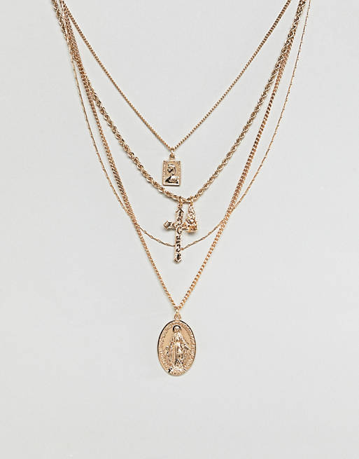 ASOS DESIGN multirow necklace with vintage style icon and cross pendants in gold