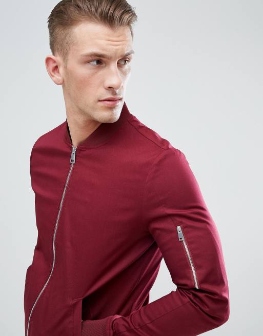 ASOS DESIGN muscle fit bomber jacket with sleeve zip in burgundy