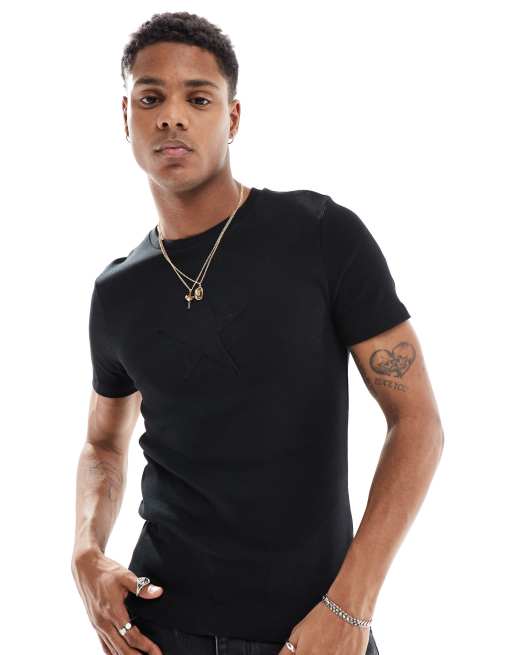 ASOS DESIGN - Muscle fit geribbeld T-shirt met applicatie in zwart